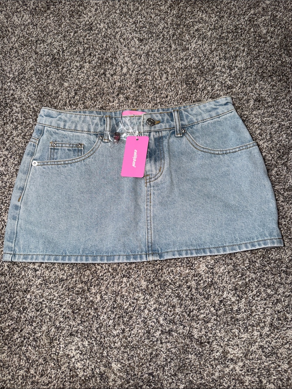 Buckle Light Blue Denim Mini Skirt with Front Pockets